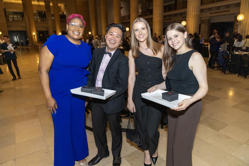 Party goers with gifts