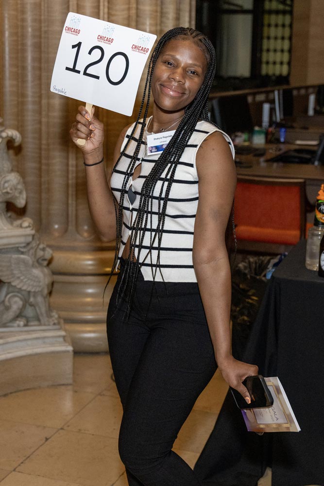 A woman holding a paddle